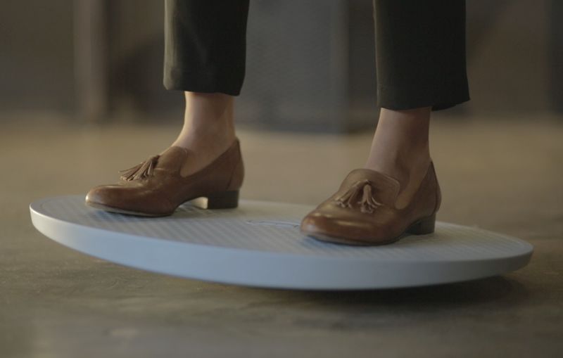 Balance boards are great equipment for fitting in a office workout.