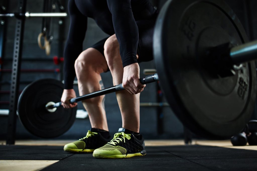 Deadlifting shoes must be able to bear weight while not being obstructed by a overly thick inside or cushion often found in running shoes.